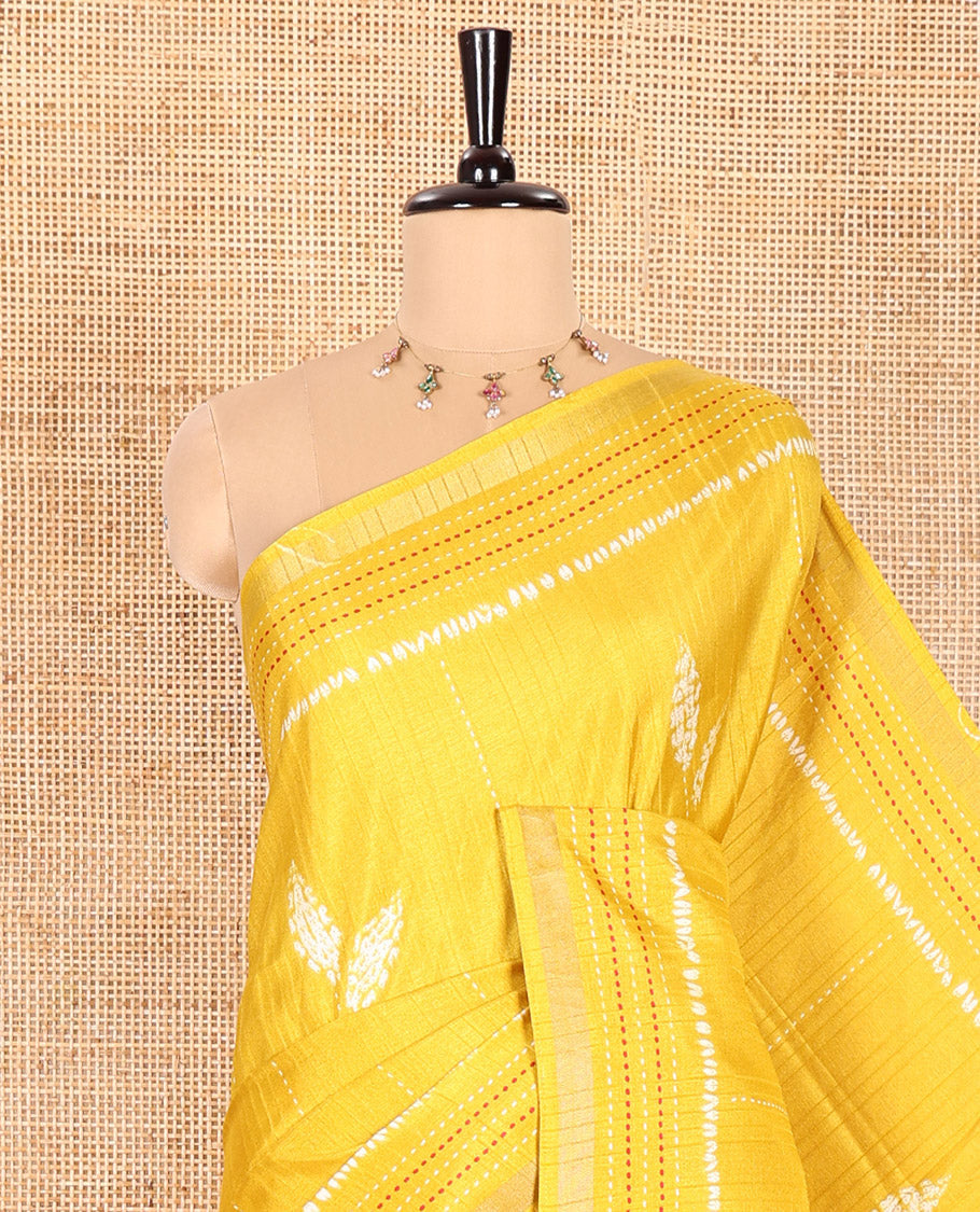 Yellow Dola Tussar Saree Decked with Shibori-Style Leaf Motifs Printed All Over Its Body, Subtly Made Zari Piping Border of Kanta Work, Complemented by Contrast Pallu of Shibori-Style Leaf Print, and Paired with Contrast Blouse