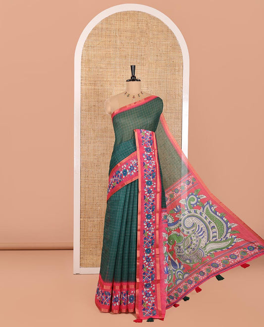 Dark Green Linen Cotton Saree, Adorned with Medium-Size Checks on Its Body, Complemented by a Contrast Kalamkari-Style Floral Printed Border, Pallu of Big Kalamkari Peacock Print, and Paired with a Contrast Floral Printed Blouse