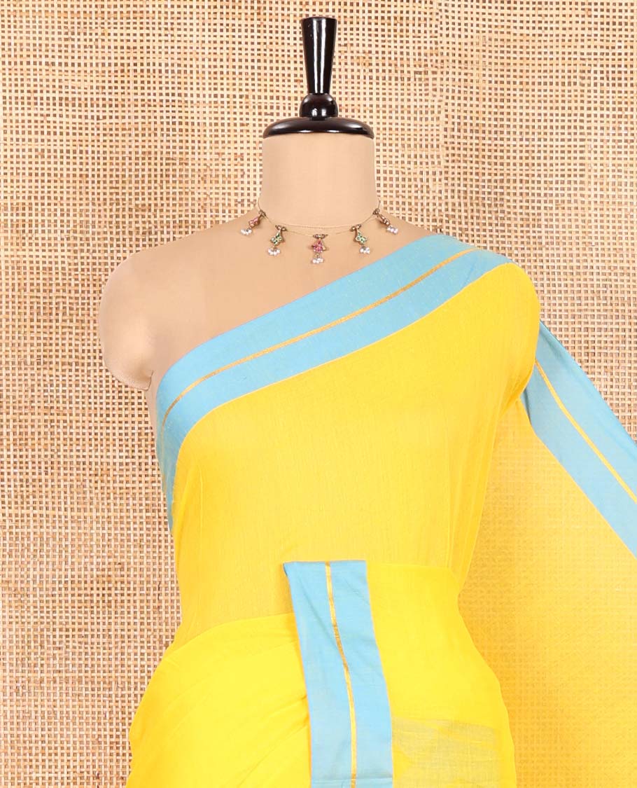 Yellow Plain Khadi Mul Cotton Saree, Complemented by Contrast Zari Striped Border, Plain Pallu, and Paired with a Matching Blouse
