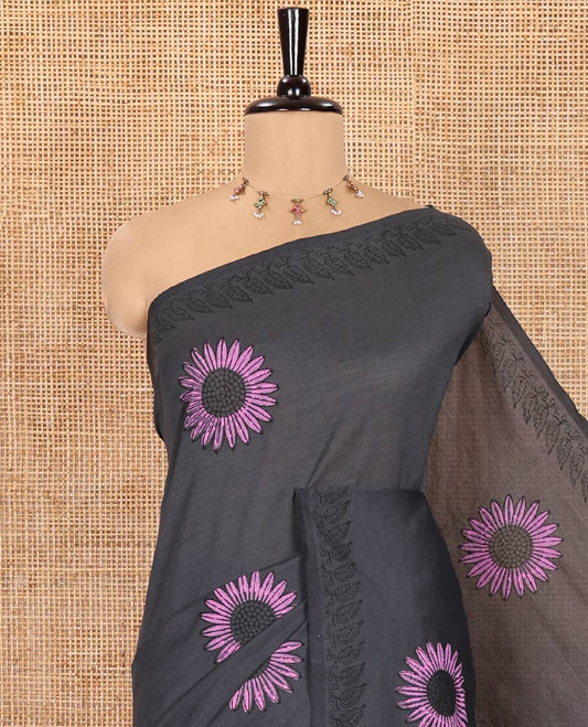 Grey South Cotton Saree, Decked Up with Handblock Printed Sunflower Motifs All Over Its Body, Subtly Block Printed Border, Paired with a Matching Blouse, and a Contrast Floral Block Printed Blouse