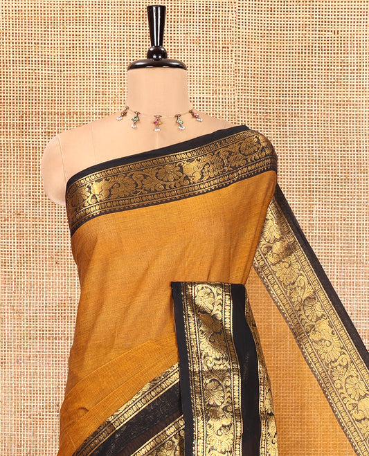 Mustard Chettinad Cotton Saree, Sparsely Woven with Buttas on Its Body, Complemented by a Contrast Rettai Pettu Border of Temple, Peacock, and Floral Creeper Designs, Pallu of Stripes and Buttas, and Paired with a Matching Blouse