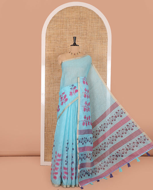 Blue Linen Saree, Adorned with Floral Motifs Printed on Its Body, a Subtle Piping Border, Pallu Steeped with Floral Motifs and Stripes, and Paired with a Contrast Blouse