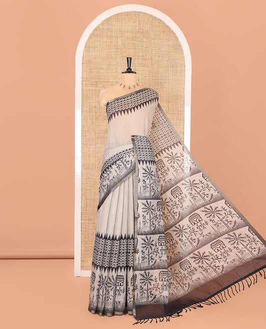 Chikku Plain Linen Cotton Saree, Artfully Printed Pallu of Temple Motifs, Circles, and Warli Village Themed Motifs Printed All Over Its Body, and Border, Pallu Pictures Warli Village Theme Motifs, and Paired with a Contrast Blouse