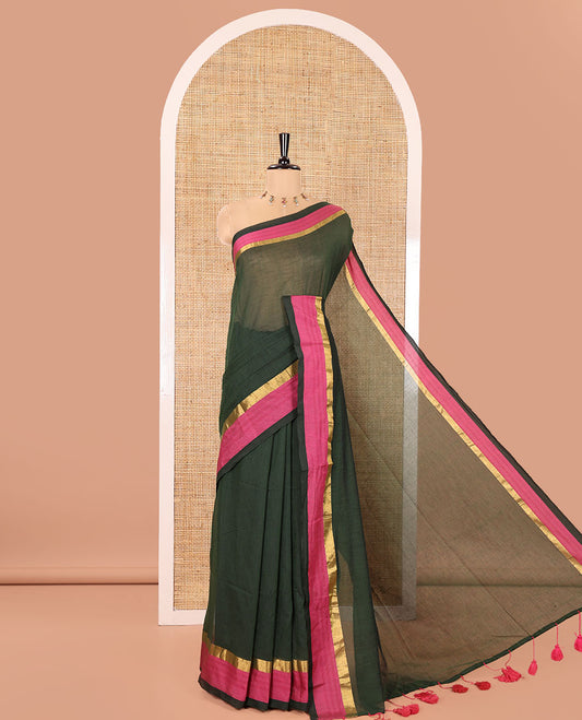 Green Plain Khadi Mul Cotton Saree, Complemented by a Contrast Pink Zari Border, Plain Pallu, and Paired with a Matching Blouse