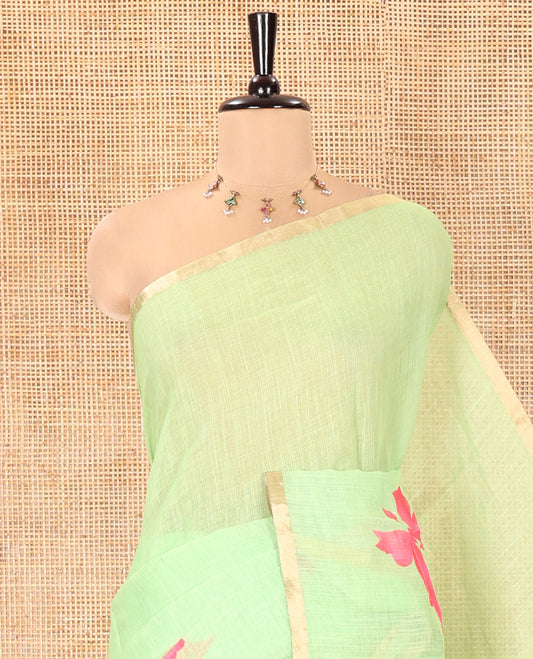 Green Linen Cotton Saree, Adorned with Butterfly Buttas All Over Its Body, Subtle Piping Border, Pallu of Butterfly Print, and Paired with a Contrast Fairy Motifs Printed Blouse