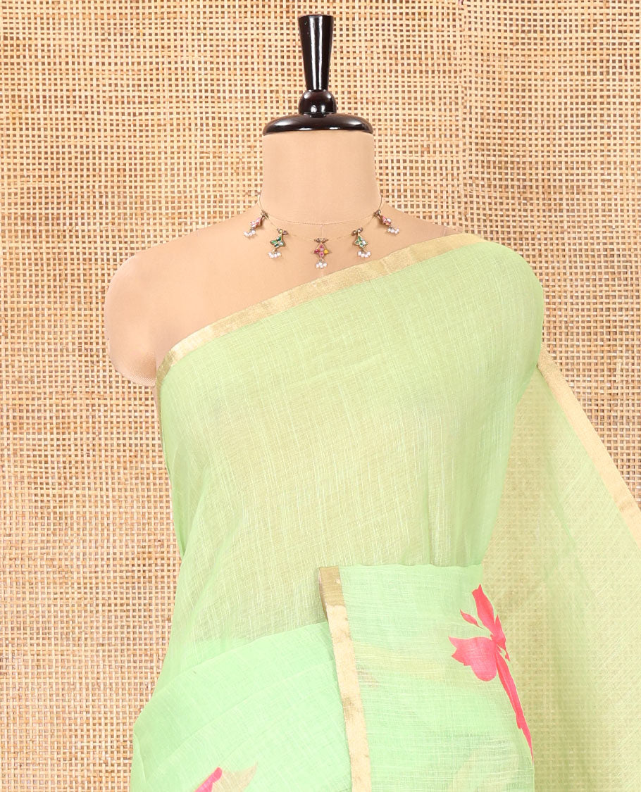 Green Linen Cotton Saree, Adorned with Butterfly Buttas All Over Its Body, Subtle Piping Border, Pallu of Butterfly Print, and Paired with a Contrast Fairy Motifs Printed Blouse