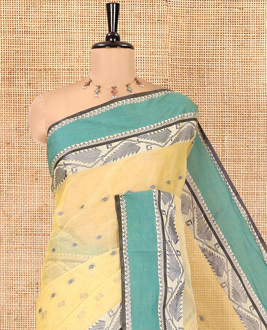 Yellow Bengal Cotton Saree, Subtly Sparkled with Thread Buttas on Its Body, Complemented by Contrast Thread Border of Floral Creeper Designs, Pallu of Stripes and Buttas, and Paired with a Matching Blouse