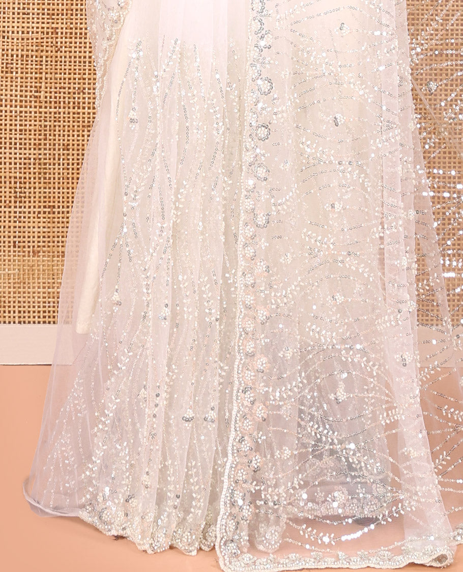 Off-White Net Saree, Enthralled with Ogee Sequins Embroidery, a Scalloped Border, and Contrast Embroidered Blouse