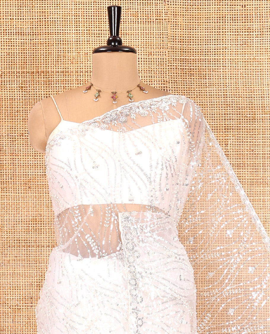 Off-White Net Saree, Enthralled with Ogee Sequins Embroidery, a Scalloped Border, and Contrast Embroidered Blouse