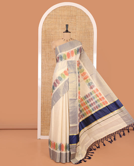 Gold Kerala Tissue Saree Features a Geometric Print, a Bavanji Border, a Geometric Pallu, and a Matching Blouse