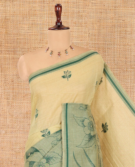 Green Munga Cotton Saree, Beautified with Floral Buttas, a Contrast Floral-Bird Printed Border, and a Matching Blouse