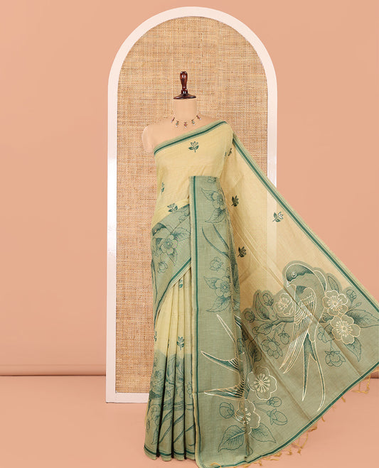 Green Munga Cotton Saree, Beautified with Floral Buttas, a Contrast Floral-Bird Printed Border, and a Matching Blouse