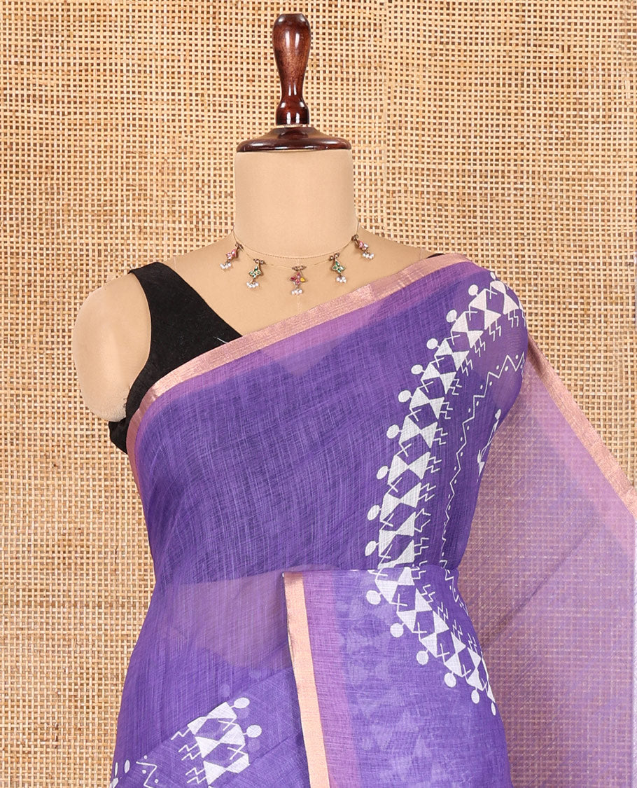 Violet Linen Cotton Saree Features Warli Print, a Contrast Piping Border, a Floral-Printed Pallu, and a Contrast Blouse