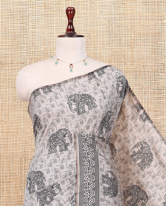 Light Brown South Cotton Saree Features Leaf and Elephant Motifs Print, a Subtle Printed Border, and a Matching Blouse