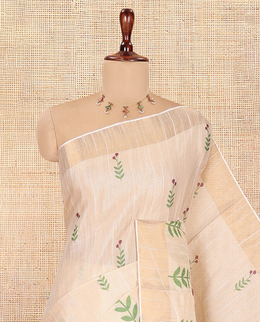 Cream-Wine Tissue Linen Cotton Saree Features Floral Buttas, a Zari Border, Floral Pallu, Matching Blouse