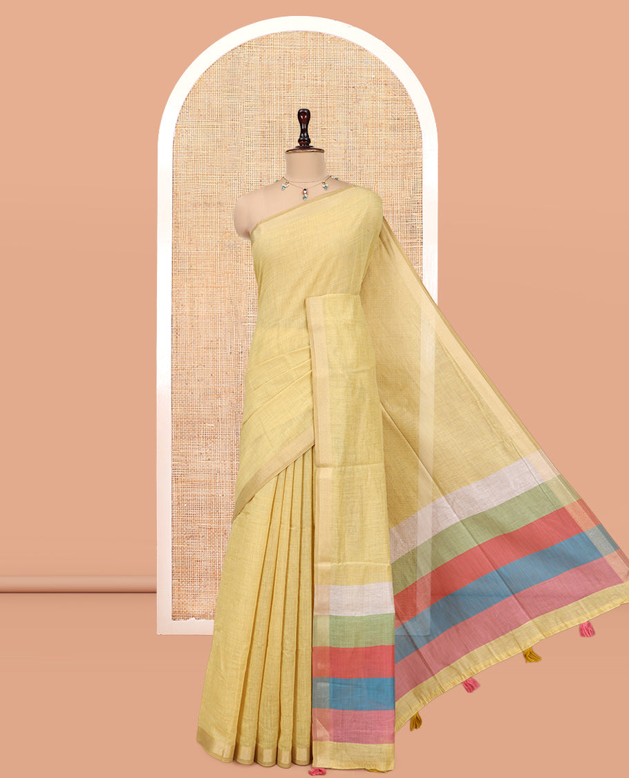 Yellow Plain Semi-Tussar Saree, a Zari Border, Multi-Colored Striped Pallu, and a Contrast Blouse