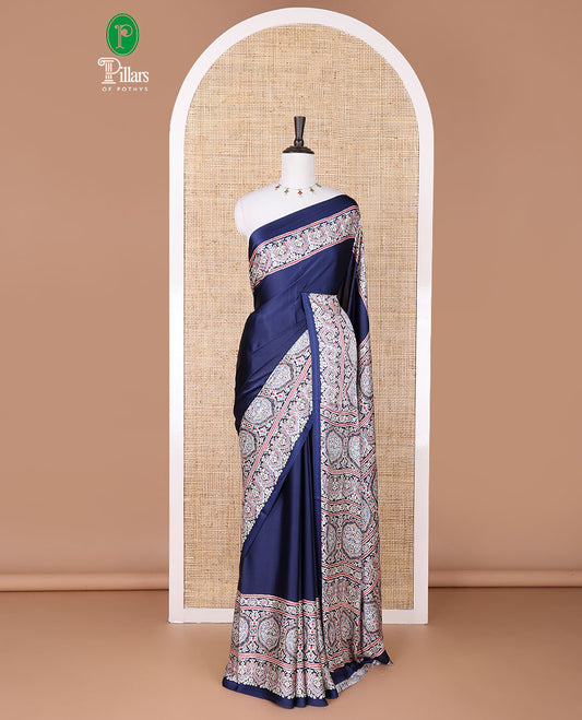 Blue modal crepe saree with ajrakh printed border & ajrakh printed pallu along with printed blouse