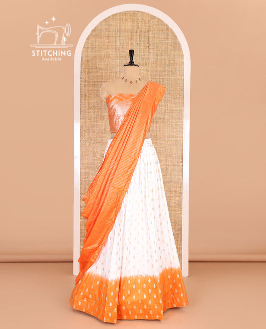 White-orange half-saree, zari buttas with contrast bordered nylon viscose crepe skirt, a jaal jacquard design Vichitra silk blouse, and a contrast striped Vichitra silk dhavani