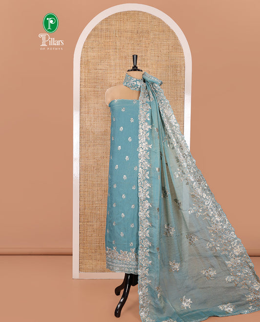 Blue Material Churidar Set, Artfully Detailed with an Floral Motifs Embroidered on Its Nc Moss Organza Top, Plain Santoon Bottom, and Nc Moss Organza Scallop Dupatta of Floral-Leaf Embroidery
