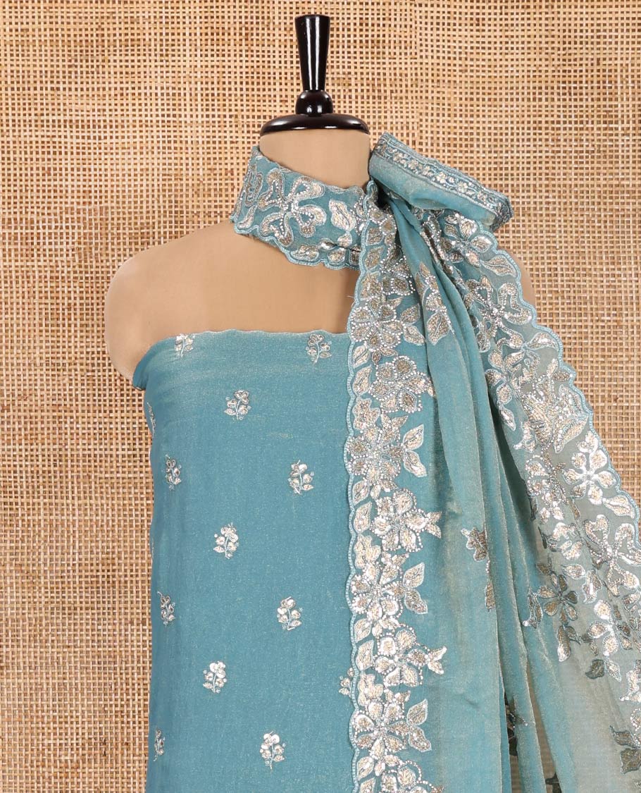 Blue Material Churidar Set, Artfully Detailed with an Floral Motifs Embroidered on Its Nc Moss Organza Top, Plain Santoon Bottom, and Nc Moss Organza Scallop Dupatta of Floral-Leaf Embroidery