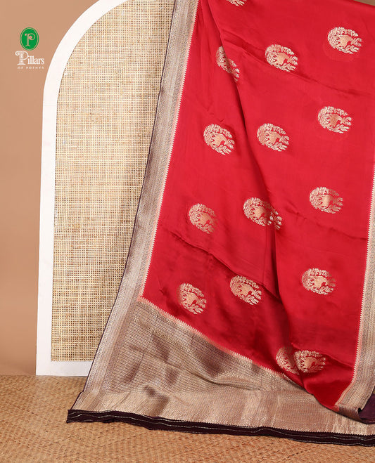Cherry red animal print mushru silk saree with bawanchi border & rich pallu along with butta design blouse