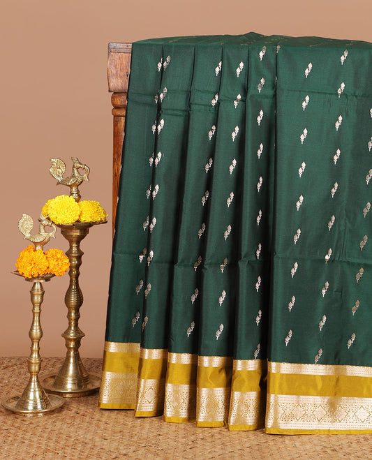 Bottle green zari butta semi soft silk saree with rettai pettu, diamond border grand pallu along with plain blouse