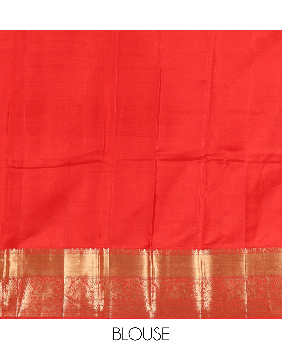 Red Vasundhara Silk Saree Traditionally Decked Up with Zari Buttas and Mamallapuram Temple Motifs, Highlighted by a Zari Border of Salangi, Muthu, Banaras, Mayil, and Lavangam Designs, Gracefully Embellished Pallu, and a Matching Blouse
