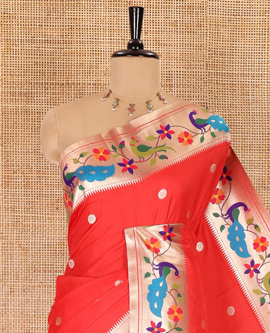Red floral buttas art silk paithani saree, contrast floral creeper and peacock design border, pallu of peacock and floral vine, and a matching blouse