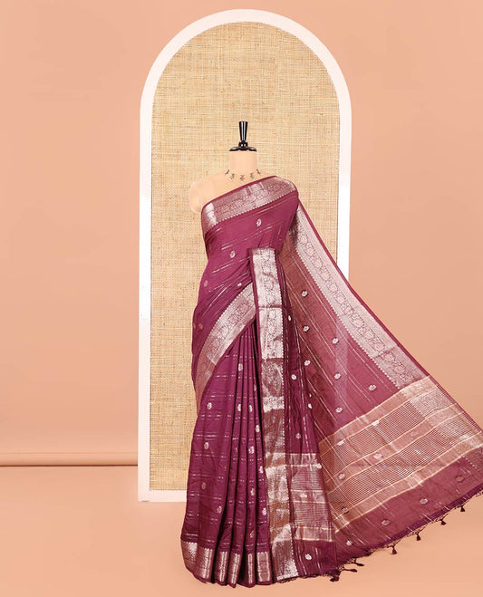 Wine Assam Silk Saree, Enthralled with Horizontal Zari Stripes and Zari Buttas All Over Its Body, Highlighted by a Traditional Zari Border of Floral Creeper Designs, Zari-Striped Pallu, and Paired with a Matching Blouse