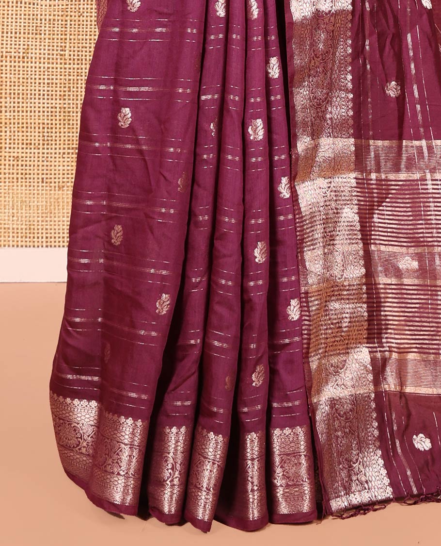 Wine Assam Silk Saree, Enthralled with Horizontal Zari Stripes and Zari Buttas All Over Its Body, Highlighted by a Traditional Zari Border of Floral Creeper Designs, Zari-Striped Pallu, and Paired with a Matching Blouse