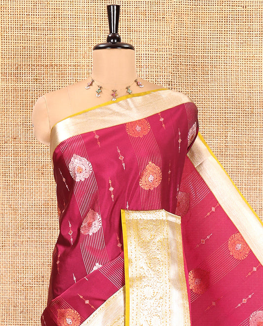 Majenta Semi-Soft Silk Saree, Opulently Embellished with Zari Designs All Over Its Body, Complemented by Contrast Traditional Zari Design Border, Pallu of Big Paisleys, and Paired with a Contrast Blouse
