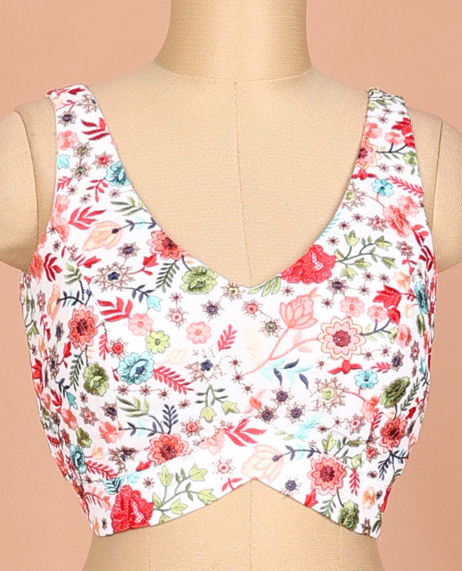 White floral motifs thread embroidered sleeveless readymade blouse with front and back deep-leaf neck