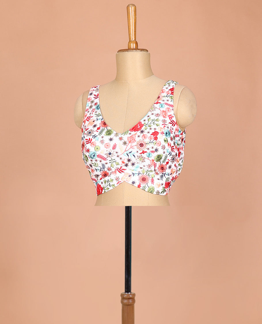 White floral motifs thread embroidered sleeveless readymade blouse with front and back deep-leaf neck