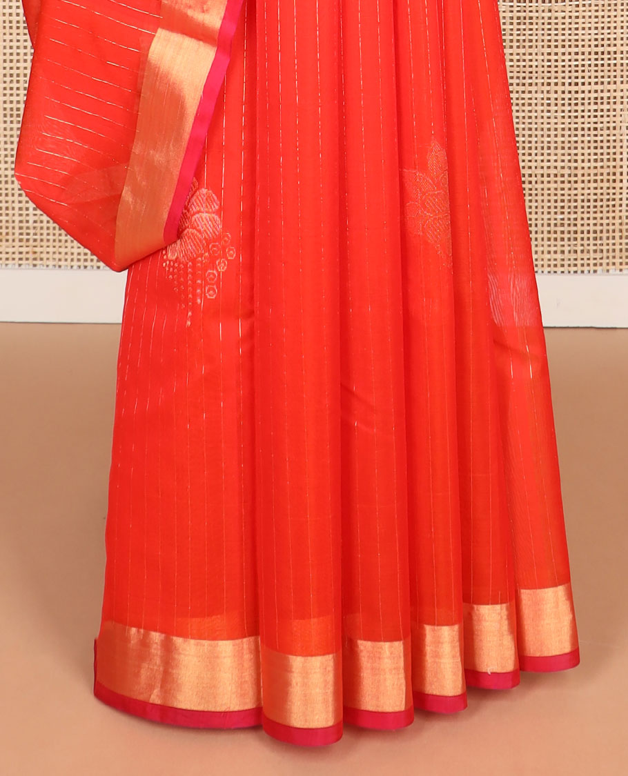 Orange striped, floral motifs silk cotton saree with contrast zari border & checked floral design pallu