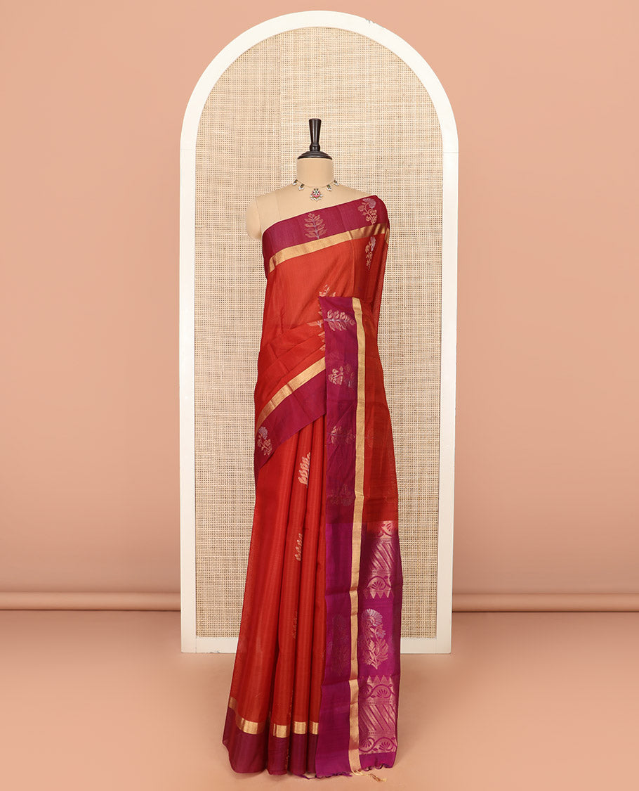 Orange Silk Cotton Saree Graced with Floral Buttas All Over the Body, Complemented by a Contrast Floral Zari Motifs Woven Border, Featuring a Contrast Pallu of Floral- Geometric Zari Designs, and Paired with a Contrast Blouse