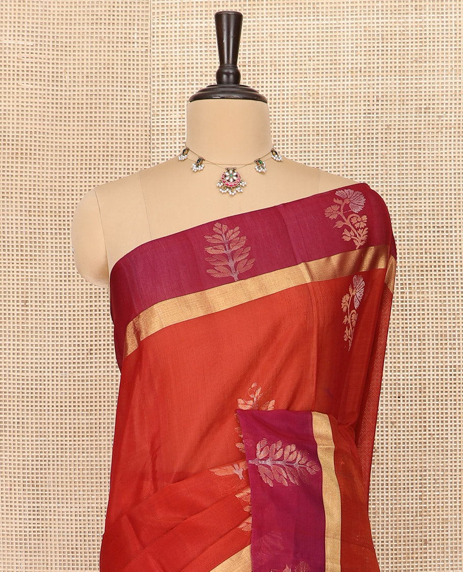 Orange Silk Cotton Saree Graced with Floral Buttas All Over the Body, Complemented by a Contrast Floral Zari Motifs Woven Border, Featuring a Contrast Pallu of Floral- Geometric Zari Designs, and Paired with a Contrast Blouse