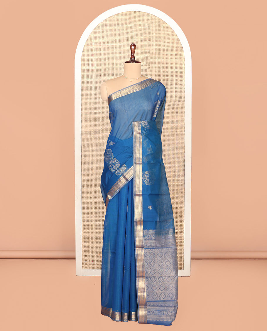 Blue Silk Cotton Saree, Accentuated with Geometric Buttas All Over Its Body, Highlighted by Traditional Zari Designs Woven Border, Intricately Designed Pallu and Paired with a Matching Blouse