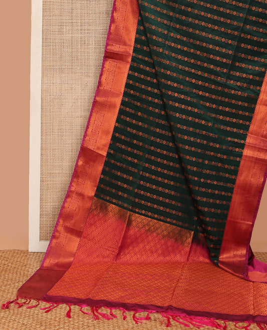 Green semi-soft silk saree with zari buttas, contrast traditional zari border & pallu of jaal design