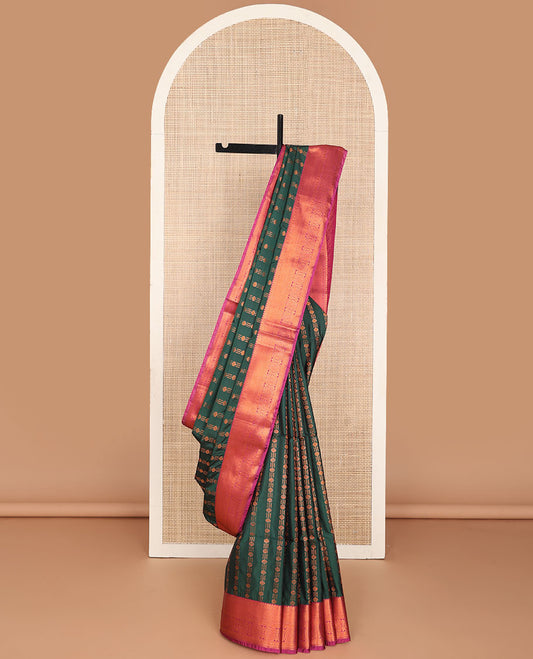 Green semi-soft silk saree with zari buttas, contrast traditional zari border & pallu of jaal design