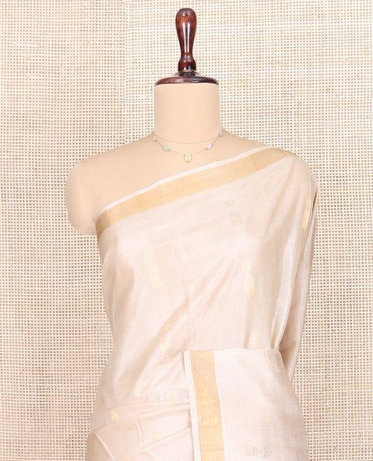 Sandal Tussar Silk Saree, Subtly Sparkled with Jhumka Buttas All Over Its Body, Subtle Piping Border, Pallu Features Chevron Stripes, and Paired with a Matching Blouse