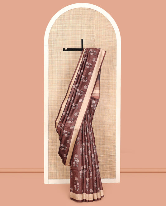 Brown Tussar Silk Saree, Detailed with Floral Motifs Print on Its Body, a Contrast Border, Multi-Color Ombre-Style Striped Pallu, and Paired with a Matching Blouse