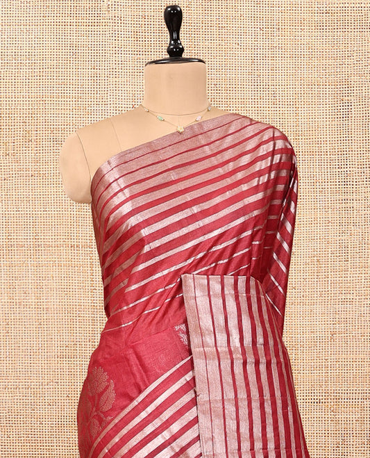 Borderless Red Tussar Silk Saree, Elegantly Framed with Zari Stripes and Floral Buttas, Striped Pallu, and a Matching Blouse