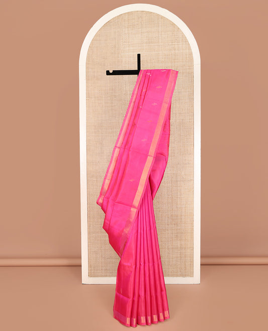Pink Uppada Silk Saree, Subtly Sparkled with Buttas All Over Its Body, Subtle Bavanji Border, Pallu Steeped with Buttas, and Paired with a Matching Blouse