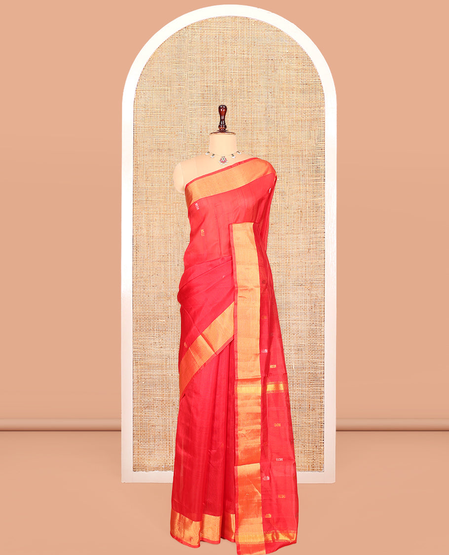 Red Uppada Silk Saree, Spotlighted with Buttas, Highlighted by a Zari Border, Zari-Woven Pallu, and a Matching Blouse