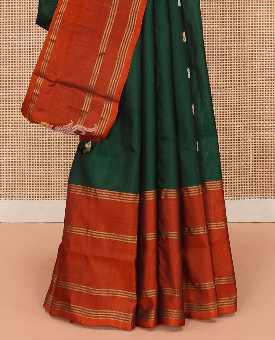 Green Uppada Silk Saree Enlivened With Zari Buttas, Captivating Contrast Border Featuring Zari Stripes And Peacock Motifs, Pallu Depicting Rose Flower-Enclosed Mughal-Style Arches, And Paired With A Contrast Blouse