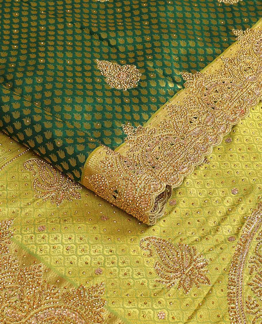 Green floral design vastrakala silk saree with stone work, contrast floral stone work scallop border & floral design in stone work pallu