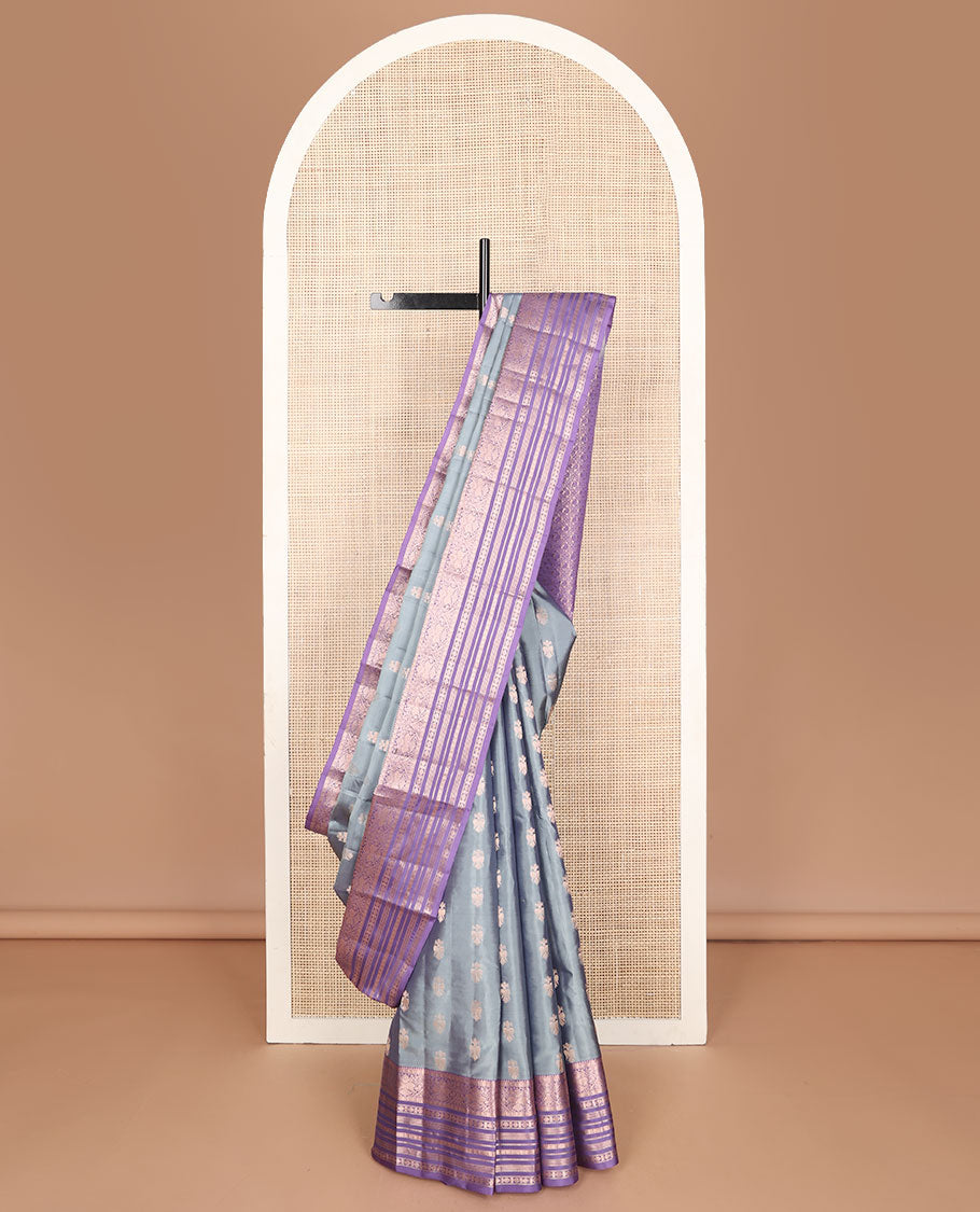 Grey vasundhara elite silk saree with iruthalaipakshi buttas, contrast border of temple, poun, iruthalaipakshi, muthu & kamalam designs & manga butta enclosed checks