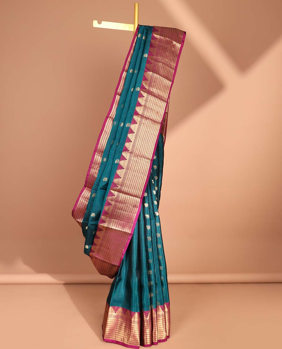 Blue paisley vasundhara silk mix saree with contrast striped, temple zari design border & intricate zari design pallu