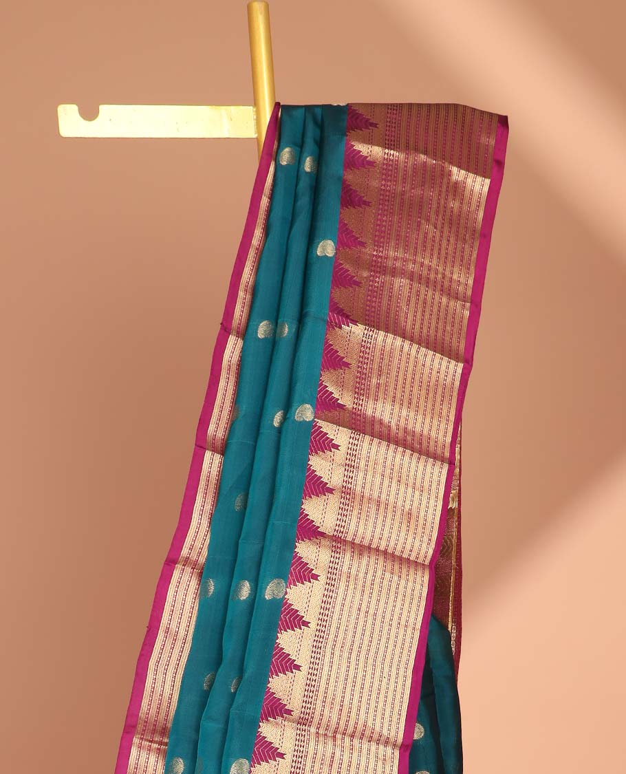 Blue paisley vasundhara silk mix saree with contrast striped, temple zari design border & intricate zari design pallu