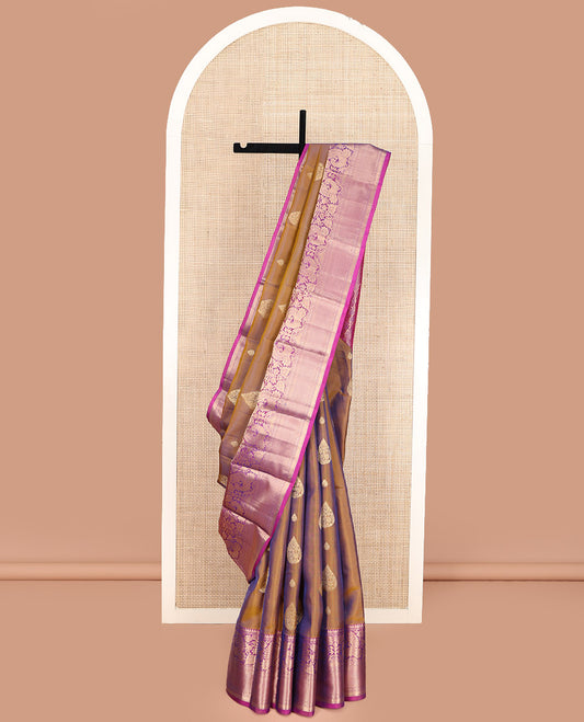 Golden Brown Vasundhara Lite Silk Mix Saree, Masterfully Woven with Zari Buttas, Complemented by a Contrast Border of Thilakam Mokku, Muthu, Mayil, Kamalam, and Mayil Kann Designs, Beautifully Bedecked Pallu, and Paired with a Contrast Blouse